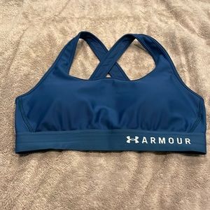Dark blue sports bra with cross back.